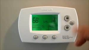 Programmable thermostat in a home.