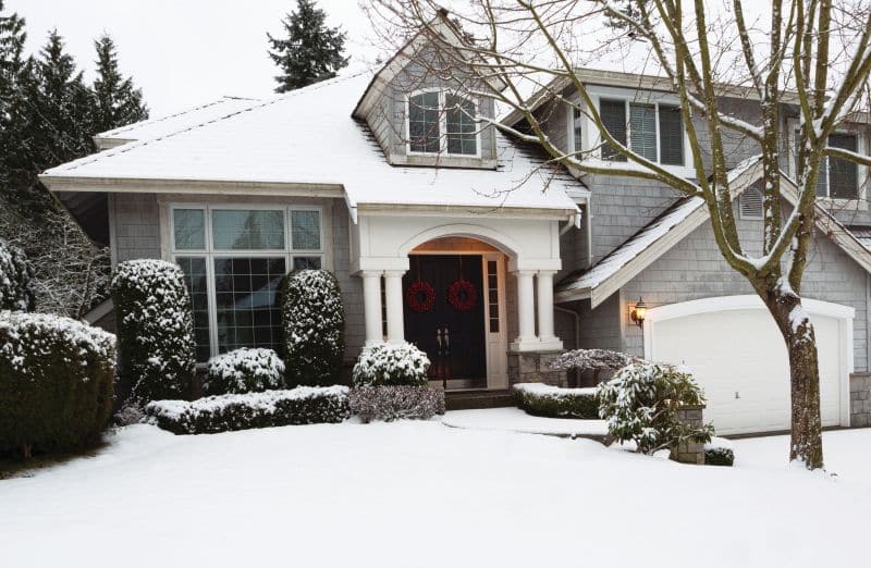 Home covered with snow.