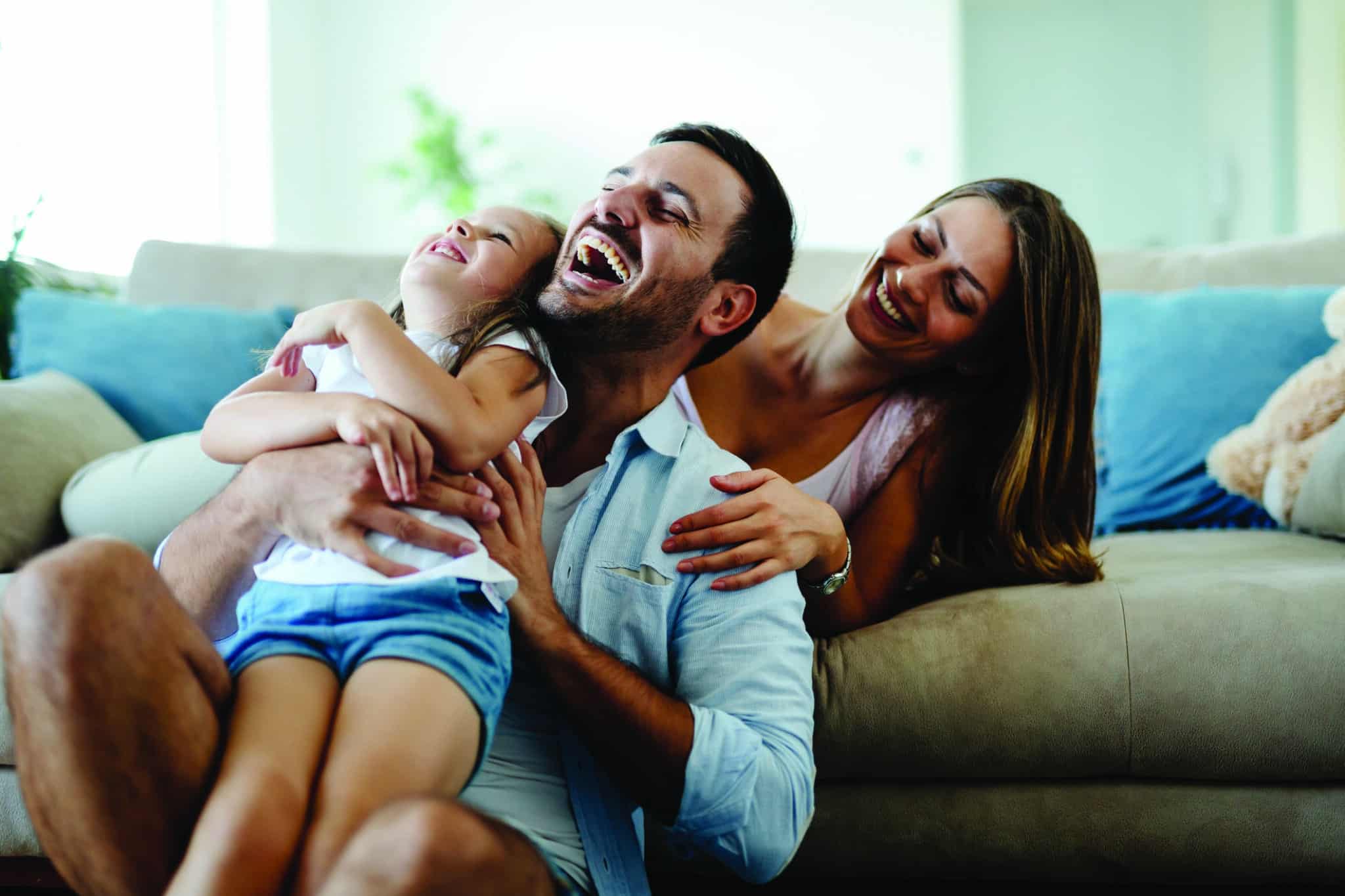 Happy family spending fun time together at home